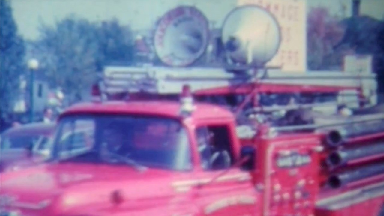 Normand DeLessard présente la parade des pompiers de St-Georges en 1961