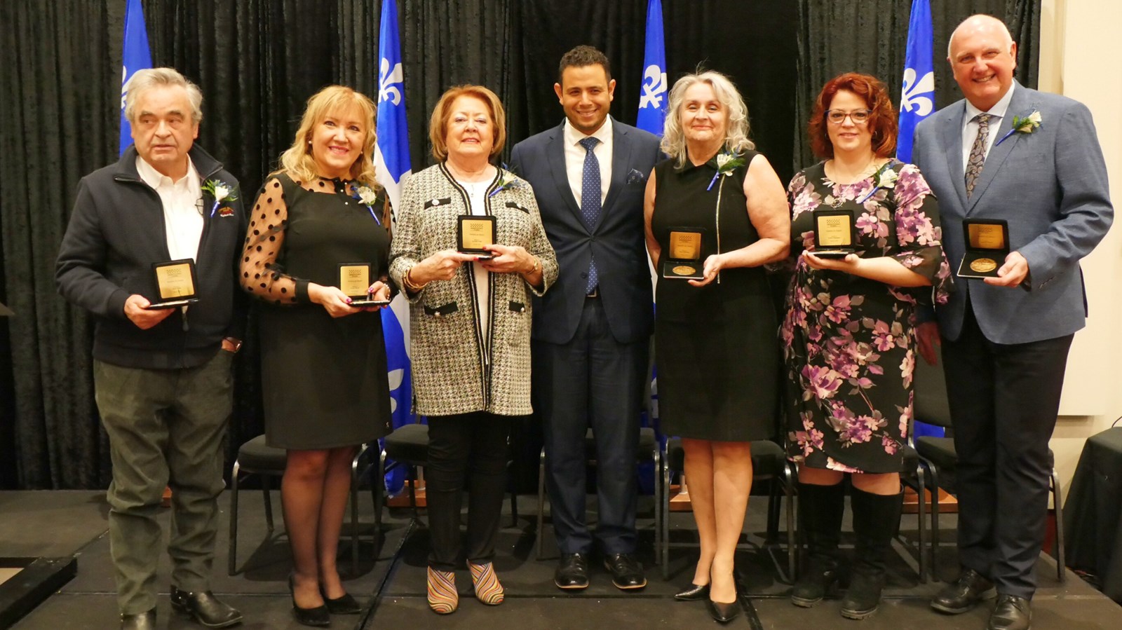 De gauche à droite : Pierre Poulin, Brigitte Busque, Jacynthe Poulin, Samuel Poulin, Hélène Rodrigue, Syndia Champagne et Normand Lessard